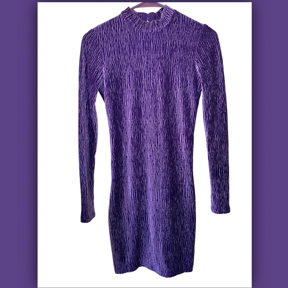 Purple long sleeve mini dress, has a back cut out, suede material - Picture 1 of 3